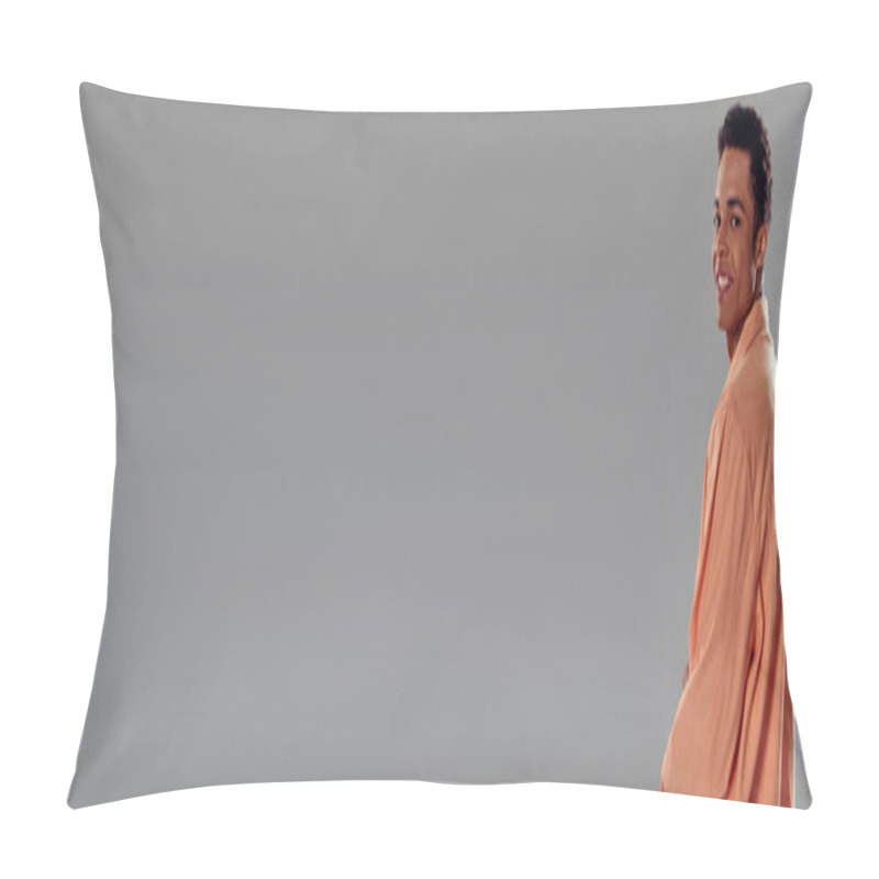 Personality  Banner Of Happy Man In Peach Shirt Standing Against Grey Wall, Showcasing His Fashion Sense Pillow Covers