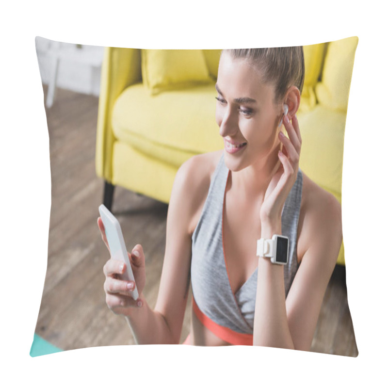 Personality  Sportswoman With Wireless Earphone And Smartwatch Holding Cellphone At Home Pillow Covers