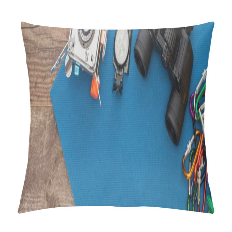 Personality  Panoramic Shot Of Gas Burner, Compass, Binoculars And Carabiners On Blue Sleeping Pad On Wooden Surface Pillow Covers