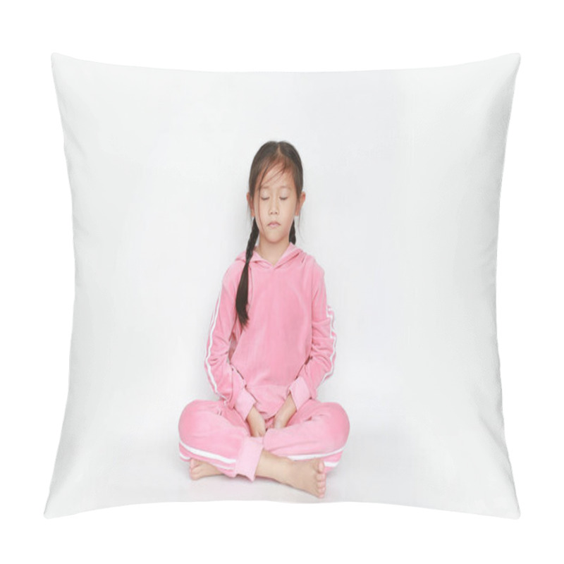 Personality  Portrait Of Beautiful Little Asian Child Girl In Pink Tracksuit Or Sport Cloth Sit In Meditation And Peace Stance Over White Background. Peaceful Concept. Pillow Covers