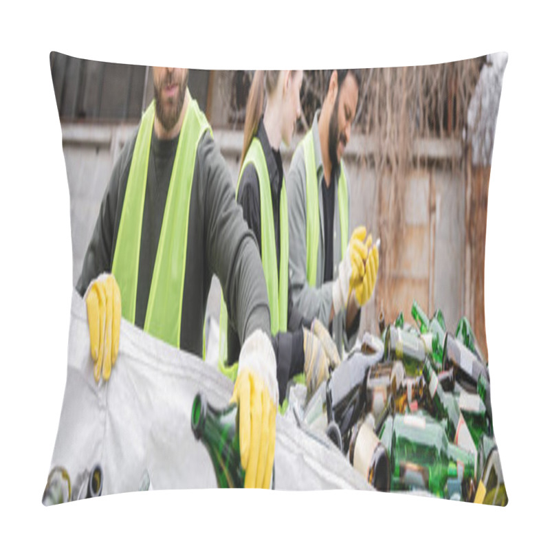 Personality  Bearded Sorter In Protective Gloves And Vest Putting Glass Bottle In Sack Near Blurred Multiethnic Colleagues In Outdoor Waste Disposal Station, Garbage Sorting And Recycling Concept, Banner  Pillow Covers