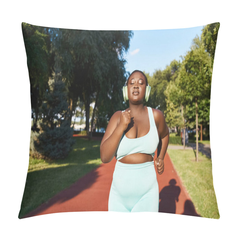 Personality  A Curvy African American Woman In Sportswear Running And Wearing Headphones, Enjoying Her Outdoor Exercise Routine. Pillow Covers