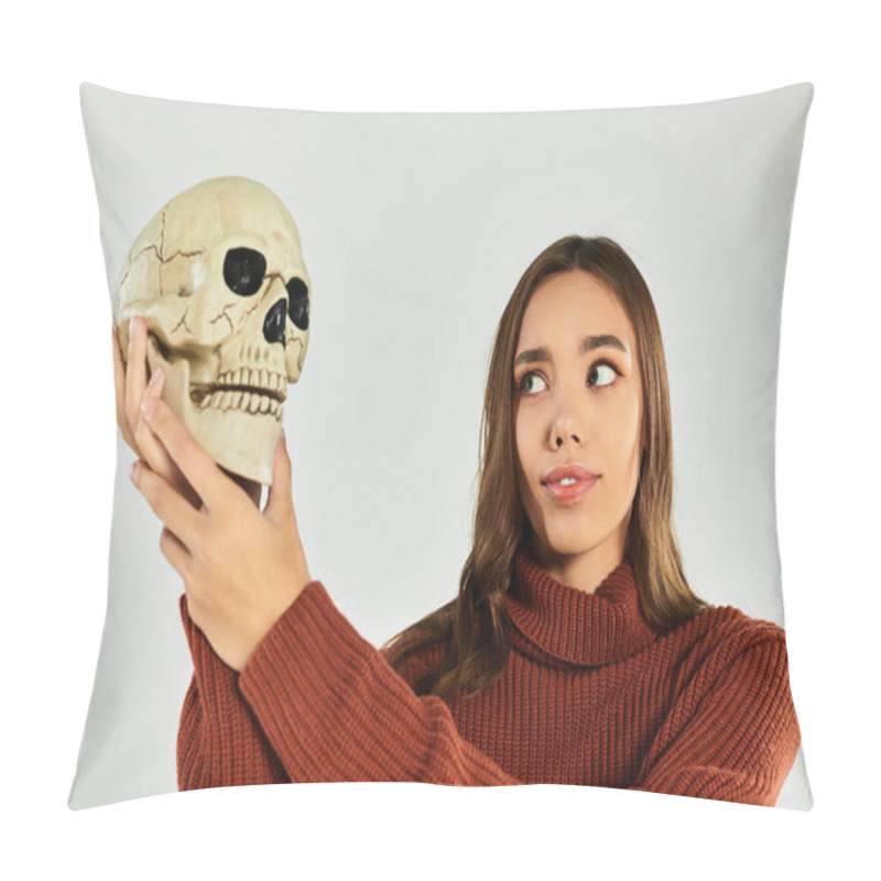 Personality  A Young, Beautiful Woman In A Sweater Holds A Skull, Embodying Halloween Vibes With Curiosity. Pillow Covers