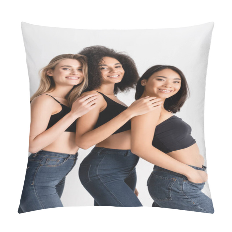 Personality  Smiling Interracial Women In Tops And Denim Jeans Posing On White Pillow Covers