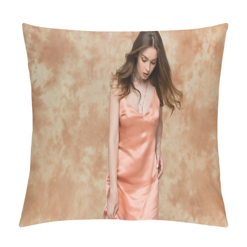 Personality  Beautiful Young Woman With Brunette Hair With Sophisticated Golden Necklace Posing In Pink Slip Dress On Mottled Beige Background, Sensuality, Elegance, Looking Down  Pillow Covers