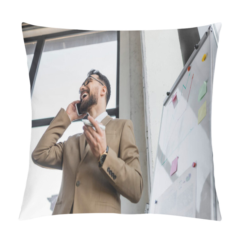 Personality  Low Angle View Of Overjoyed Bearded Businessman In Beige Stylish Blazer Holding Marker And Talking On Smartphone Near Flip Chart With Infographics And Sticky Notes In Office Pillow Covers