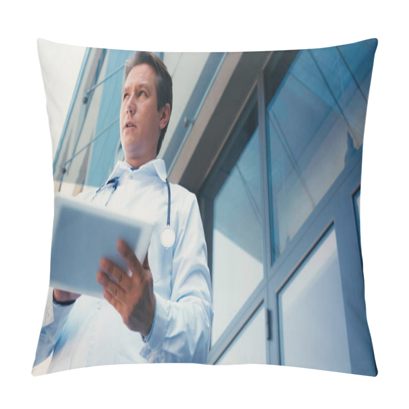 Personality  Low Angle View Of Doctor With Digital Tablet Near Building Of Clinic Pillow Covers