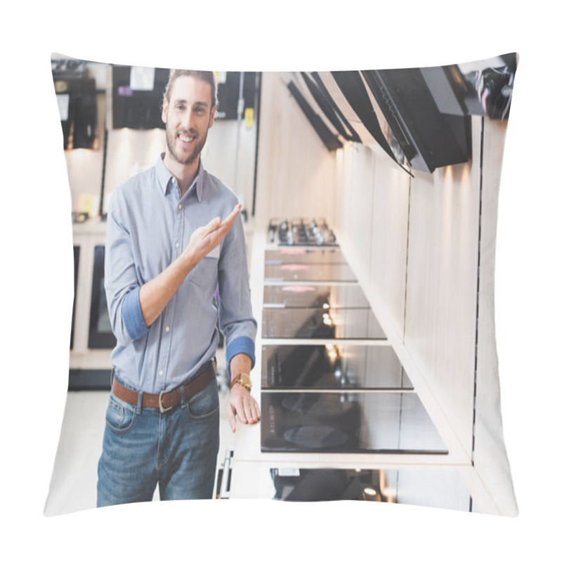 Personality  Smiling Consultant Pointing With Hand At Cooker Hoods In Home Appliance Store Pillow Covers