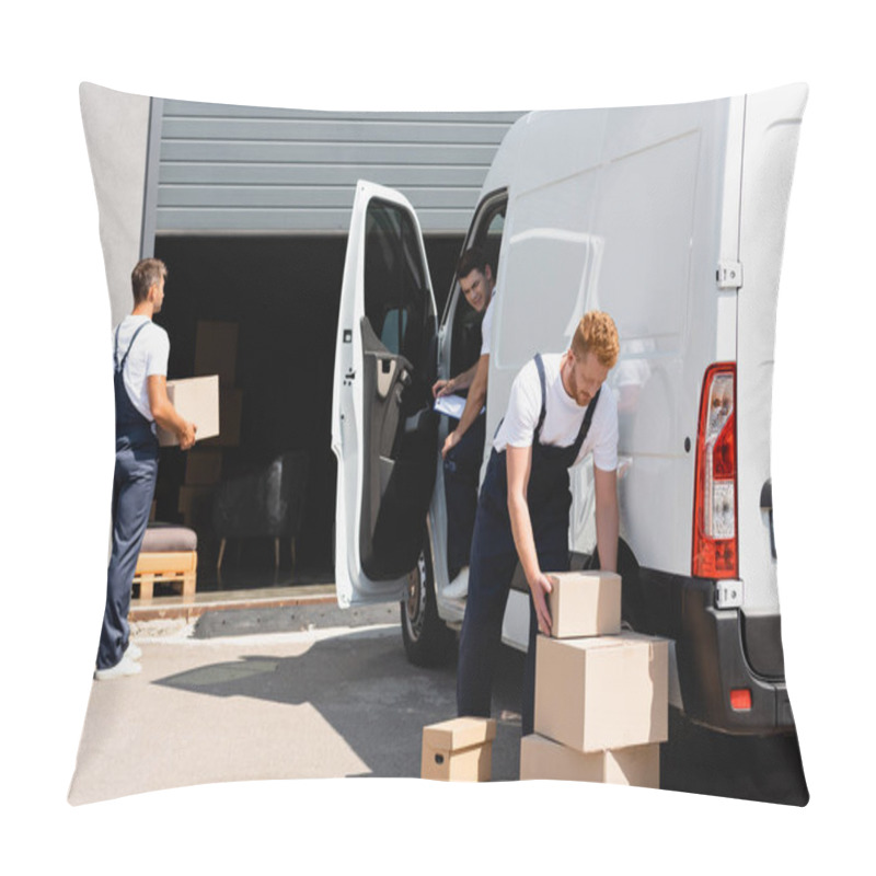 Personality  Selective Focus Of Loader In Overalls Taking Cardboard Box While Colleagues Working Near Truck On Urban Street  Pillow Covers