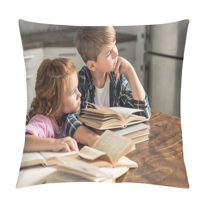 Personality  Thoughtful Brother And Sister Sitting At Table With Pile Of Books And Looking Away Pillow Covers