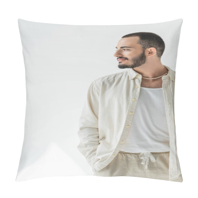 Personality  Bearded And Short Haired Homosexual Man In Beige Shirt And Stylish Pearl Necklace Looking Away And Holding Hand In Pocket Of Pants Made Of Natural Fabrics On Grey Background With Sunlight  Pillow Covers