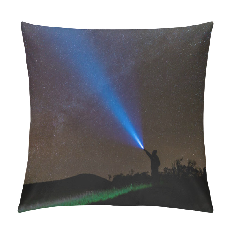 Personality  Climber Or Backpacker. Light Holds Up Over His Head. Standing On Mountain Peak. Man With Flashlight Point To The Starry Sky At Midnight. Tourist With Flashlight Pillow Covers