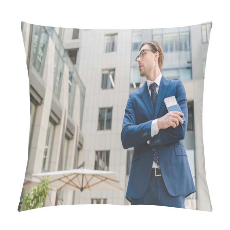 Personality  Bottom View Of Thoughtful Young Businessman With Crossed Arms Holding Flight Tickets Pillow Covers