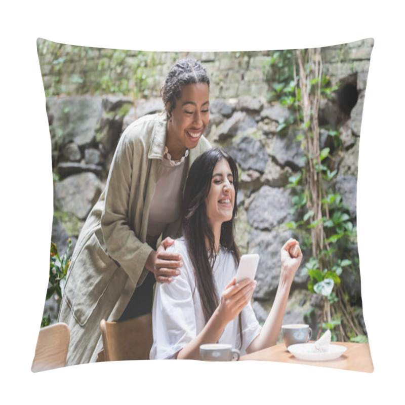 Personality  Cheerful African American Woman Standing Near Friend Holding Smartphone And Showing Yes Gesture In Outdoor Cafe  Pillow Covers