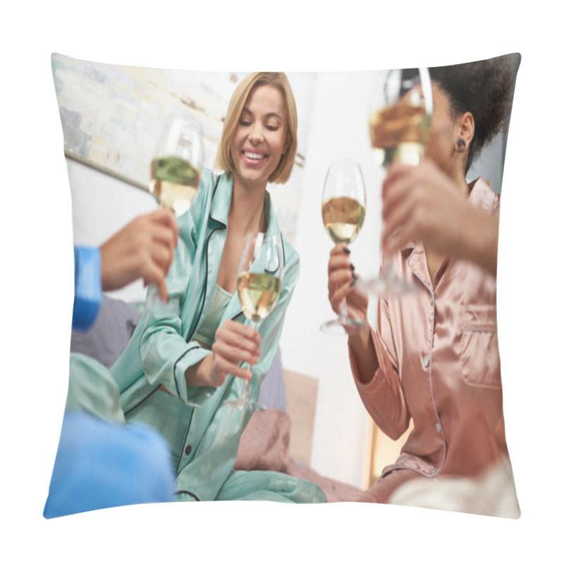 Personality  Smiling Blonde Woman Holding Glass Of Wine Near Blurred Multiethnic Girlfriends In Colorful Pajama While Sitting On Bed During Girls Night At Home, Bonding Time In Comfortable Sleepwear Pillow Covers