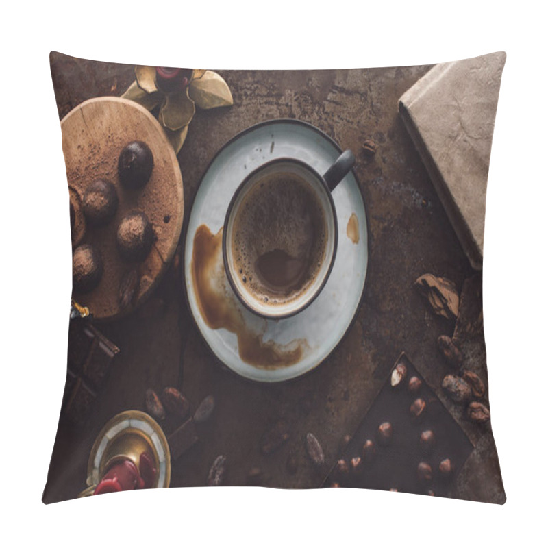 Personality  Elevated View Of Cup Of Coffee, Truffles On Wooden Slice, Candles, Cocoa Beans, Books And Two Chocolate Bars On Rustic Table  Pillow Covers