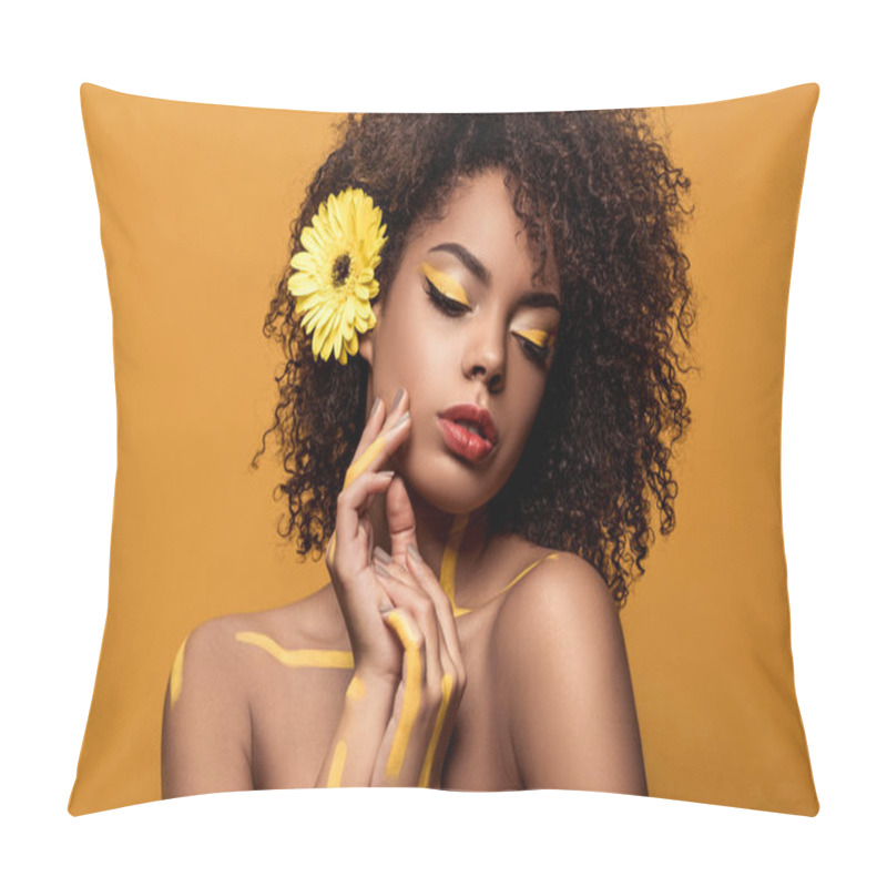 Personality  Stylish African American Woman With Artistic Make-up And Gerbera In Hair Holds Hands Near Face Isolated On Orange Background Pillow Covers