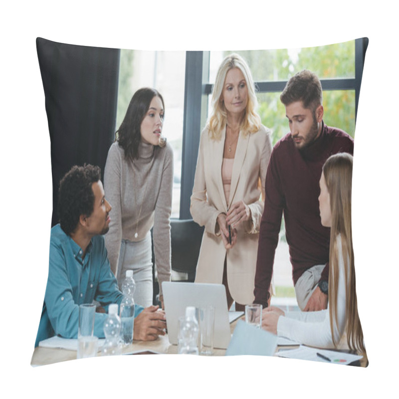 Personality  Attractive, Mature Businesswoman Looking At Colleague At Business Meeting With Multicultural Coworkers Pillow Covers