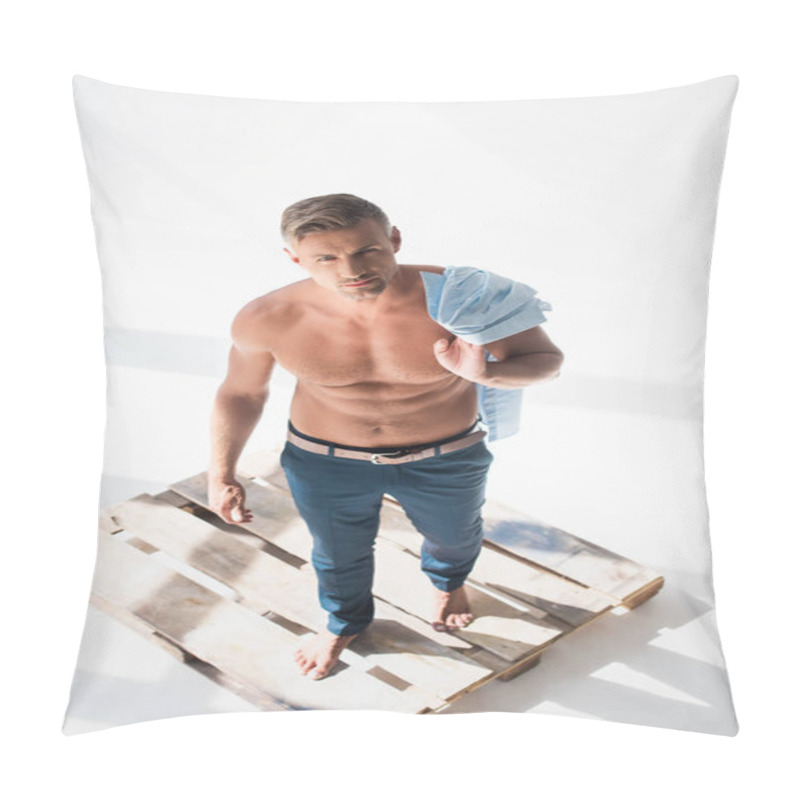 Personality  High Angle View Of Shirtless Handsome Adult Man Standing On Pallet On White And Looking At Camera Pillow Covers