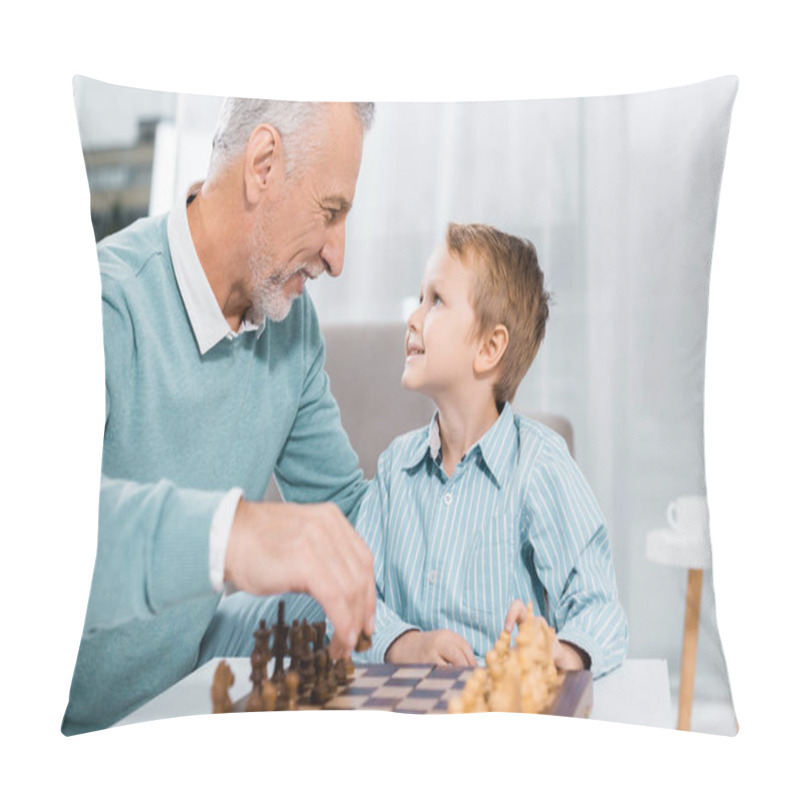 Personality  Side View Of Happy Grandson And Grandfather Looking At Each Other While Playing Chess At Home Pillow Covers