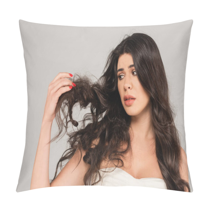 Personality  Displeased Brunette Woman Looking At Long And Tousled Hair Isolated On Grey Pillow Covers