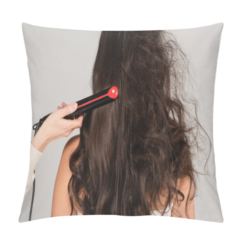 Personality  Hairdresser With Hair Iron Straightening Wavy And Tousled Hair Of Brunette Woman Isolated On Grey Pillow Covers