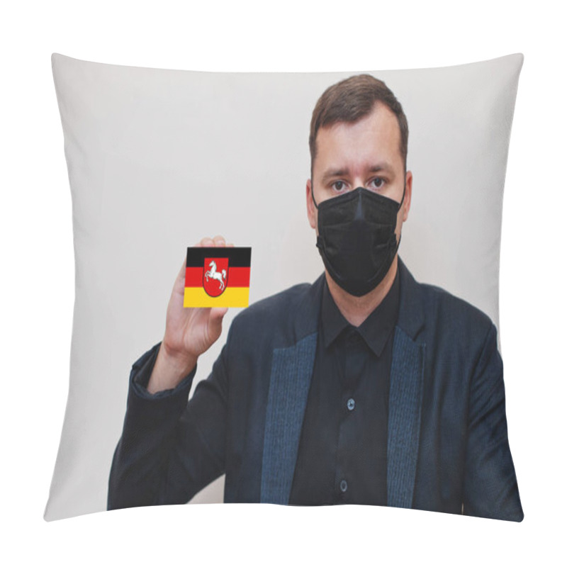 Personality  German Man Wear Black Formal And Protect Face Mask, Hold Lower Saxony Flag Card Isolated On White Background. Germany States Coronavirus Covid Concept. Pillow Covers