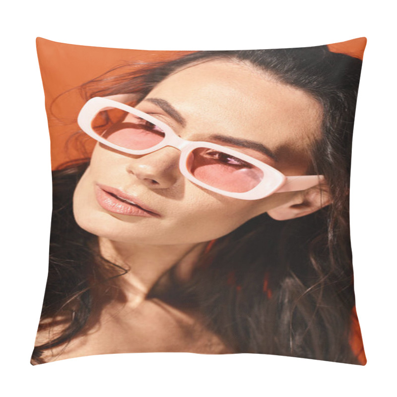 Personality  A Fashionable Woman With Long Hair Sporting Pink Sunglasses Exuding Summertime Vibes In A Studio Against An Orange Background. Pillow Covers