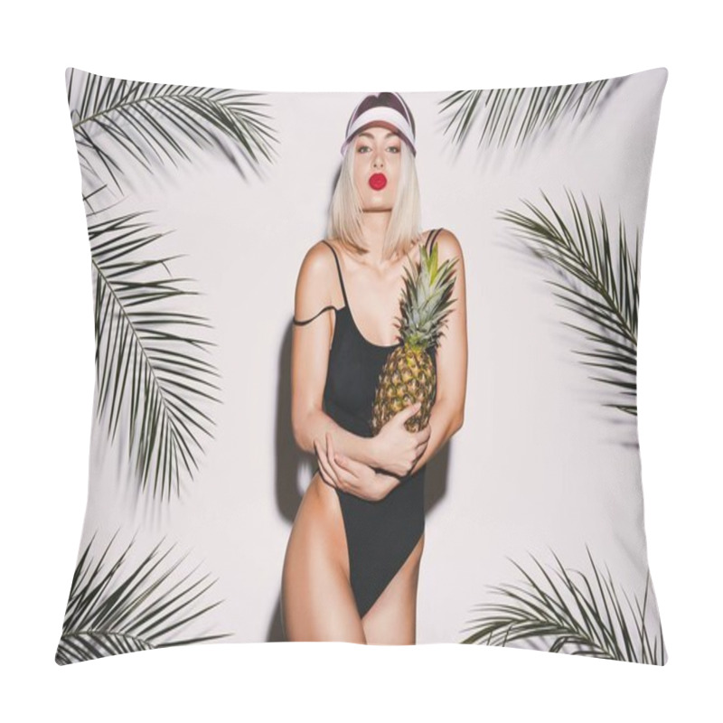 Personality  Young Girl With Blonde Hair Wearing Black Swimming Suit And Pink Cap Standing With Pineapple At White Studio Background With Palms Pillow Covers