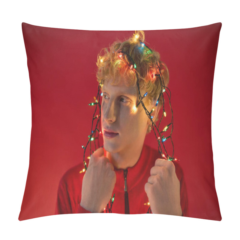 Personality  In A Lively Display Of Holiday Cheer, A Man Showcases Playful Fashion Adorned With Colorful Christmas Lights. Set Against A Bright Red Backdrop, He Embodies The Spirit Of Christmas In A Unique Way. Pillow Covers