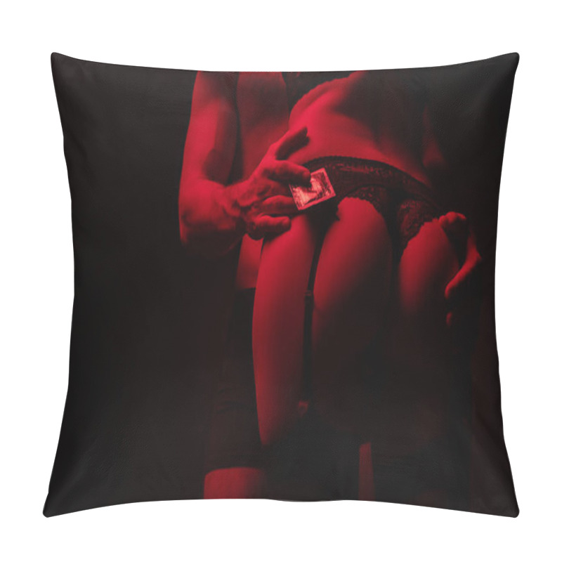 Personality  Cropped View Of Man Holding Condom And Touching Sexy Woman Butt In Red Light Isolated On Black Pillow Covers