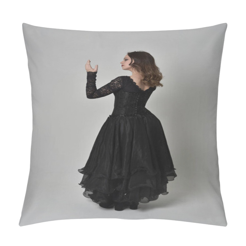 Personality  Full Length Portrait Of Brunette Girl Wearing Long Black Lace Gown Wit Corset. Standing Pose With Back To The Camera. Isolated On Grey Studio Background. Pillow Covers