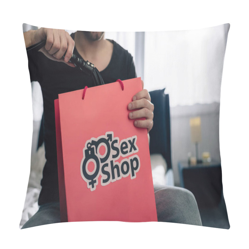 Personality  Cropped View Of Man Holding Flogging Whip And Shopping Bag With Sex Shop Lettering  Pillow Covers