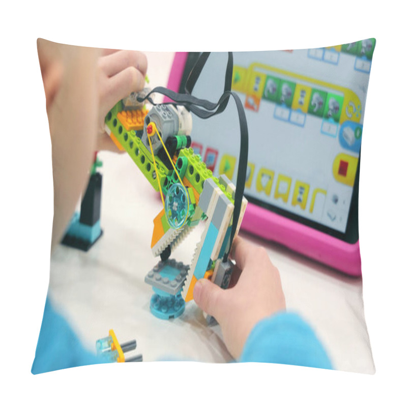 Personality  Child Building Robotics Project With Tablet. A Young Child Assembling A Colorful Robotics Kit With A Tablet Showing Programming Instructions Pillow Covers