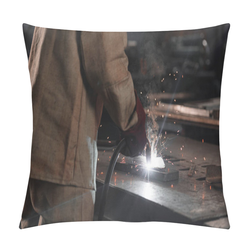 Personality  Cropped Shot Of Of Manufacture Worker Welding Metal With Sparks At Factory  Pillow Covers