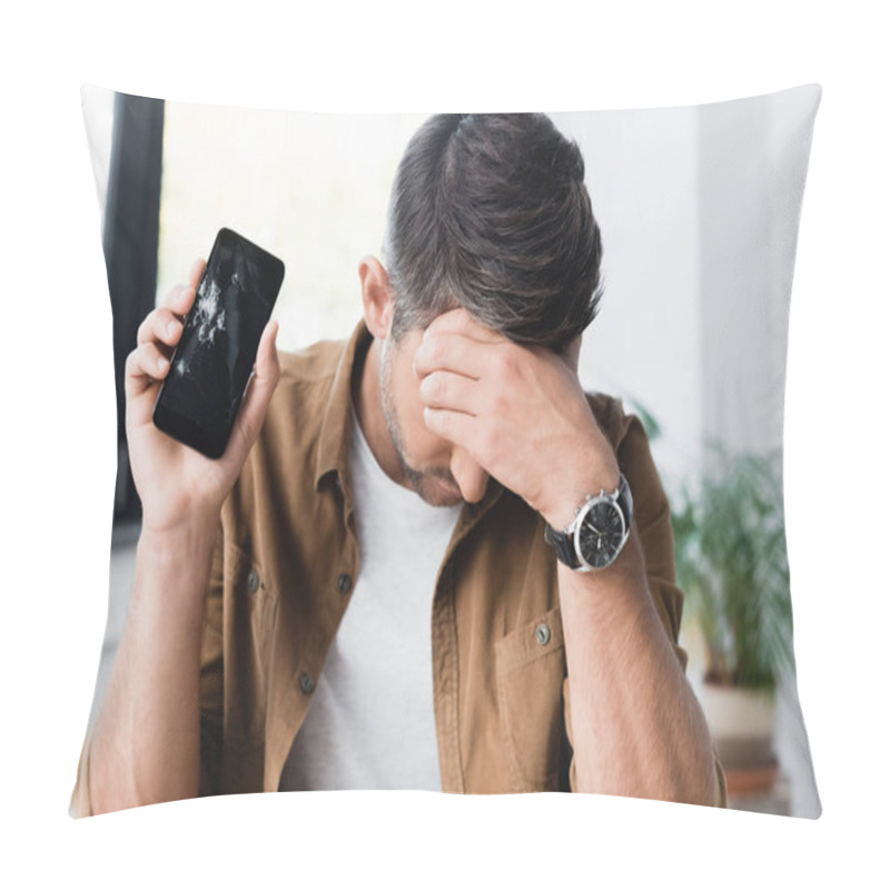 Personality  Disappointed Businessman With Hand On Forehead, Holding Smashed Smartphone On Blurred Background Pillow Covers