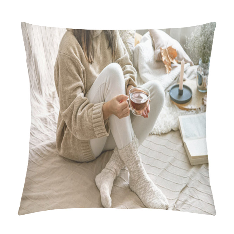 Personality  Cozy Autumn Or Winter At Home, A Woman In A Knitted Sweater With A Cup Of Tea And A Book . Pillow Covers