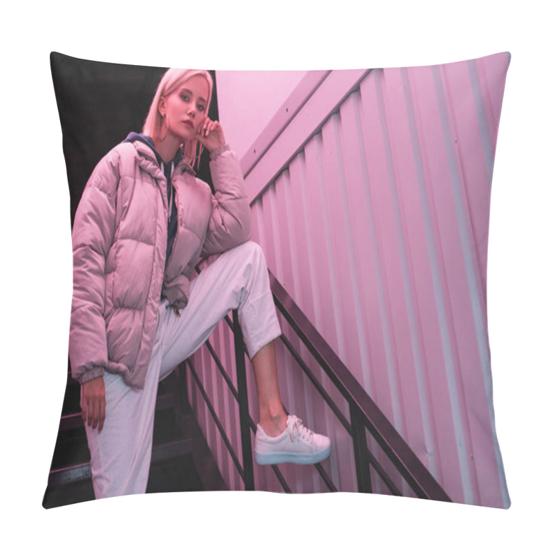 Personality  Blonde Young Woman In Down Jacket Looking At Camera On Stairs Pillow Covers