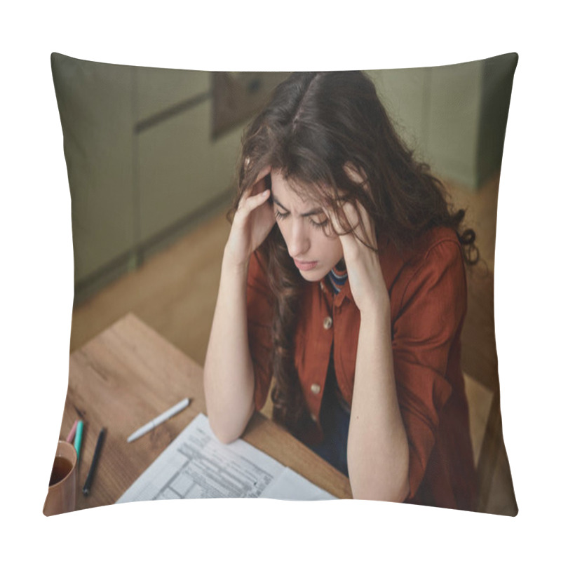 Personality  A Woman Sits At A Wooden Table, Lost In Thought, Grappling With Her Feelings Of Despair. Pillow Covers