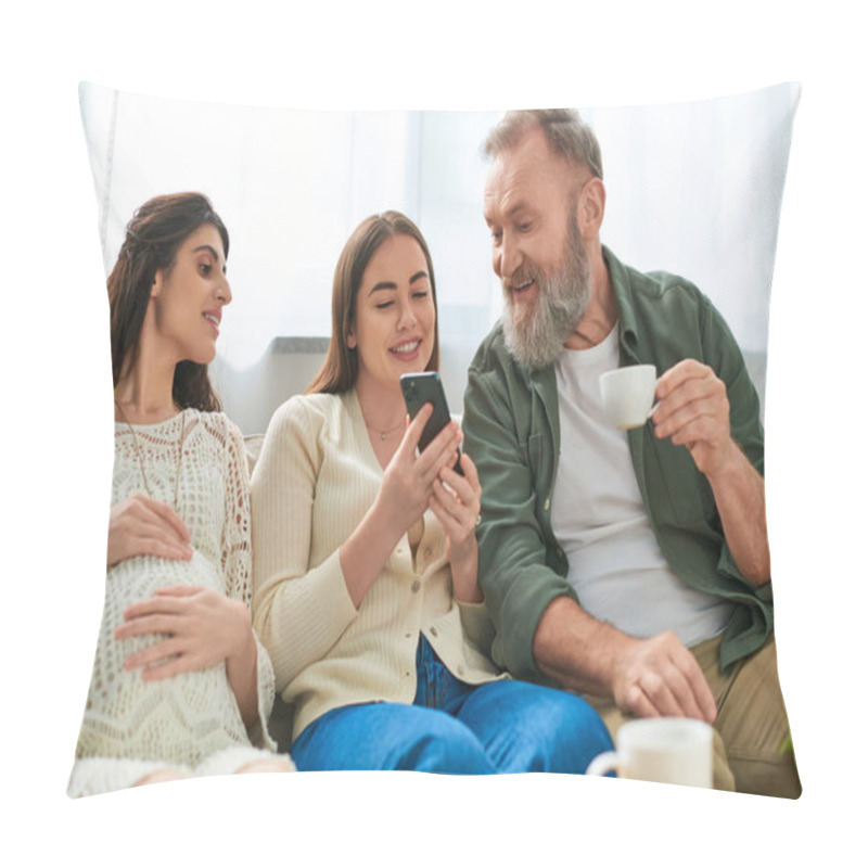 Personality  jolly father paid visit to his daughter and her partner, on sofa looking at phone, ivf concept pillow covers