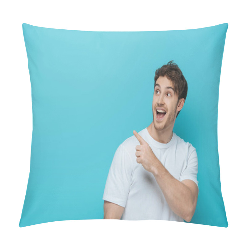 Personality  Surprised Guy Looking Away And Pointing With Finger On Blue Background Pillow Covers