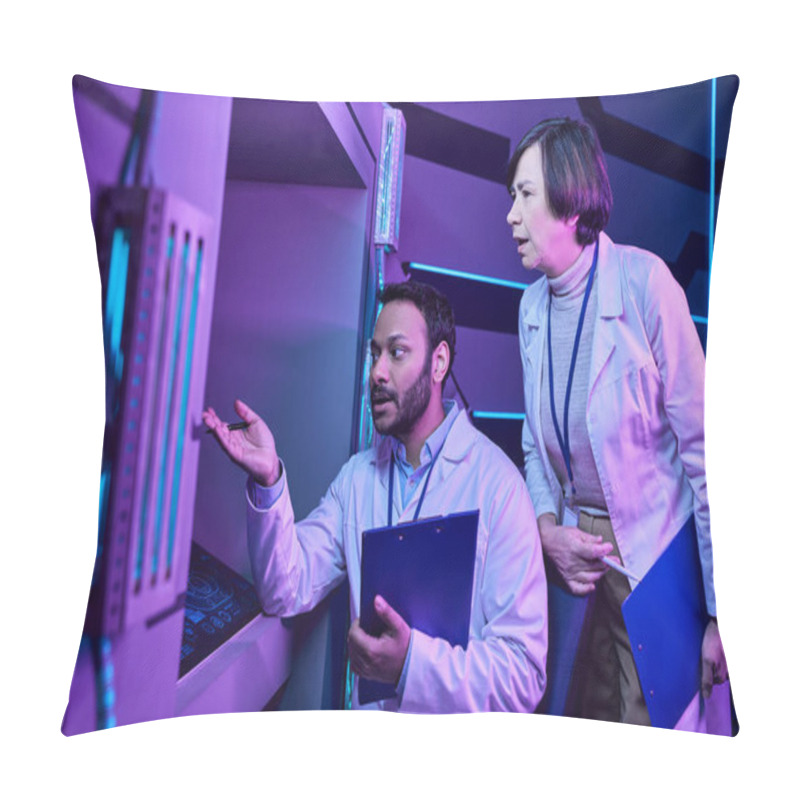 Personality  Hindu Male And Adult Female Scientists Engage With Computer In Neon-Lit Science Center Pillow Covers