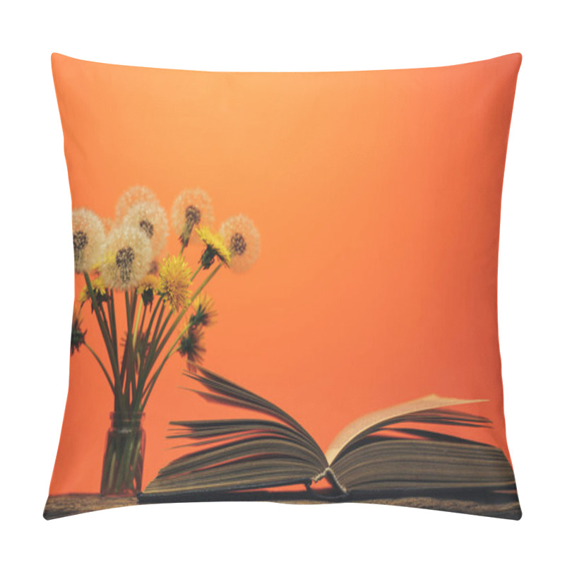 Personality  Open Book And  Yellow Flower Dandelion On A Old Oak Table And Coral Orange  Wall Background. Pillow Covers