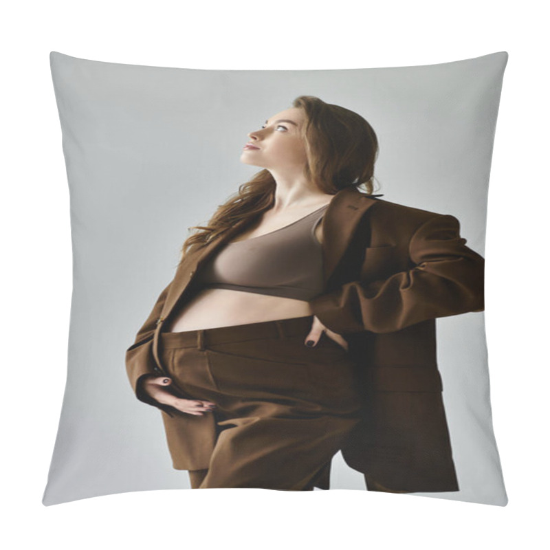 Personality  A Young Pregnant Woman Elegantly Poses In A Stylish Brown Suit With A Blazer Against A Grey Background. Pillow Covers