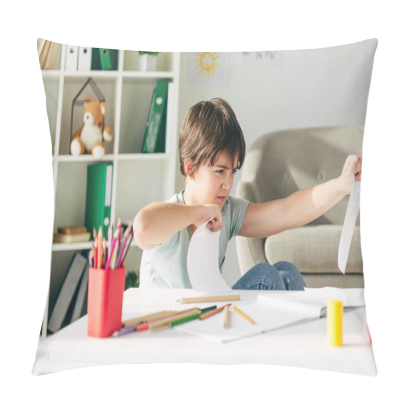 Personality  Irritated Kid With Dyslexia Punching Paper And Sitting At Table Pillow Covers