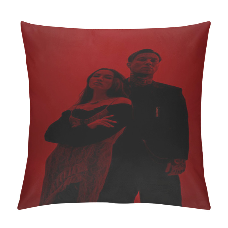 Personality  A Stylish Young Couple Stands Together, Exuding Confidence In A Vivid Red Setting. Pillow Covers