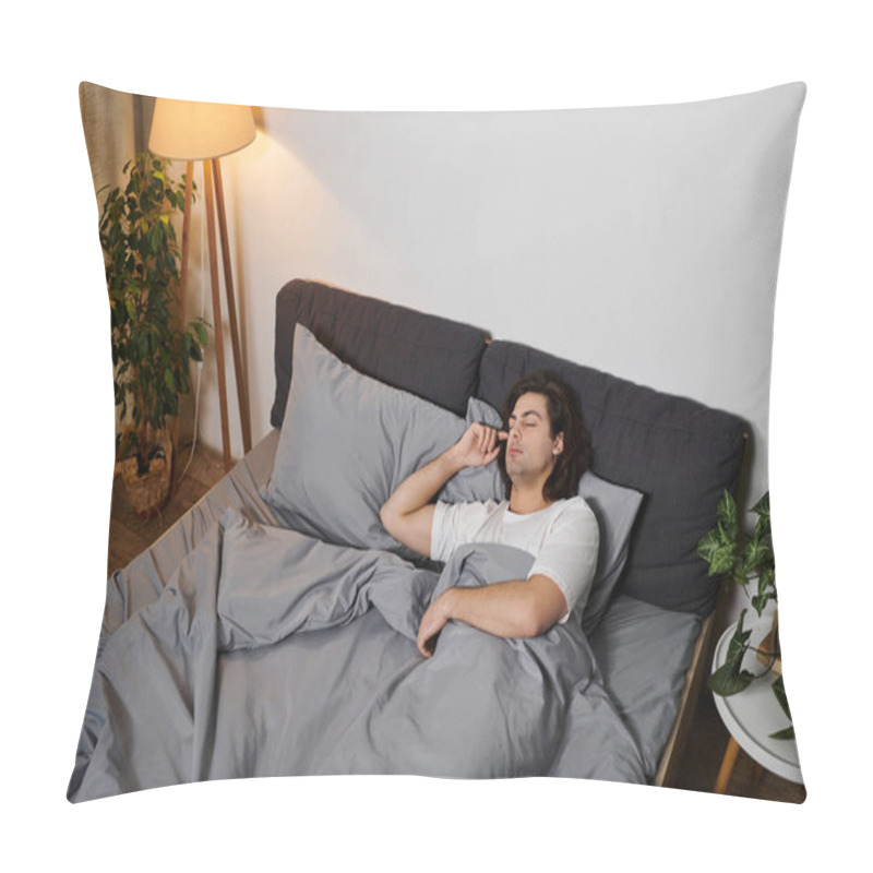 Personality  A Young Man Enjoys A Peaceful Moment In Bed, Embracing Comfort In His Stylish Apartment. Pillow Covers