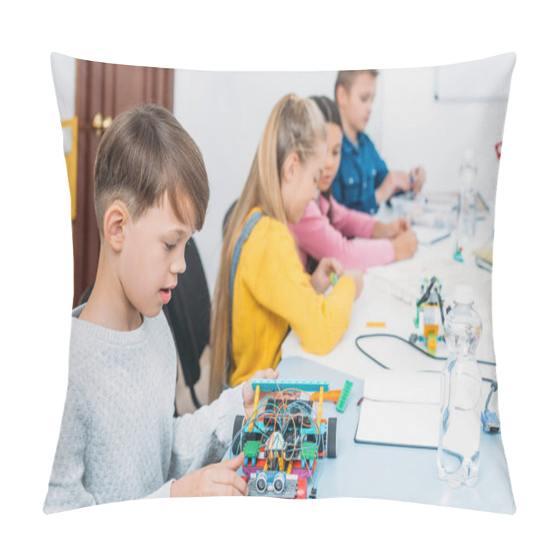 Personality  Focused Children Working Together On STEM Project In Classrom Pillow Covers