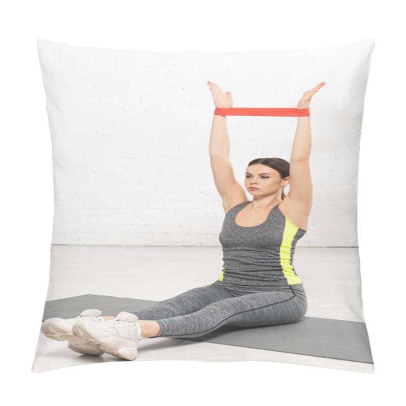 Personality  Sportive Woman With Outstretched Hands Sitting On Fitness Mat And Working Out With Resistance Band Pillow Covers