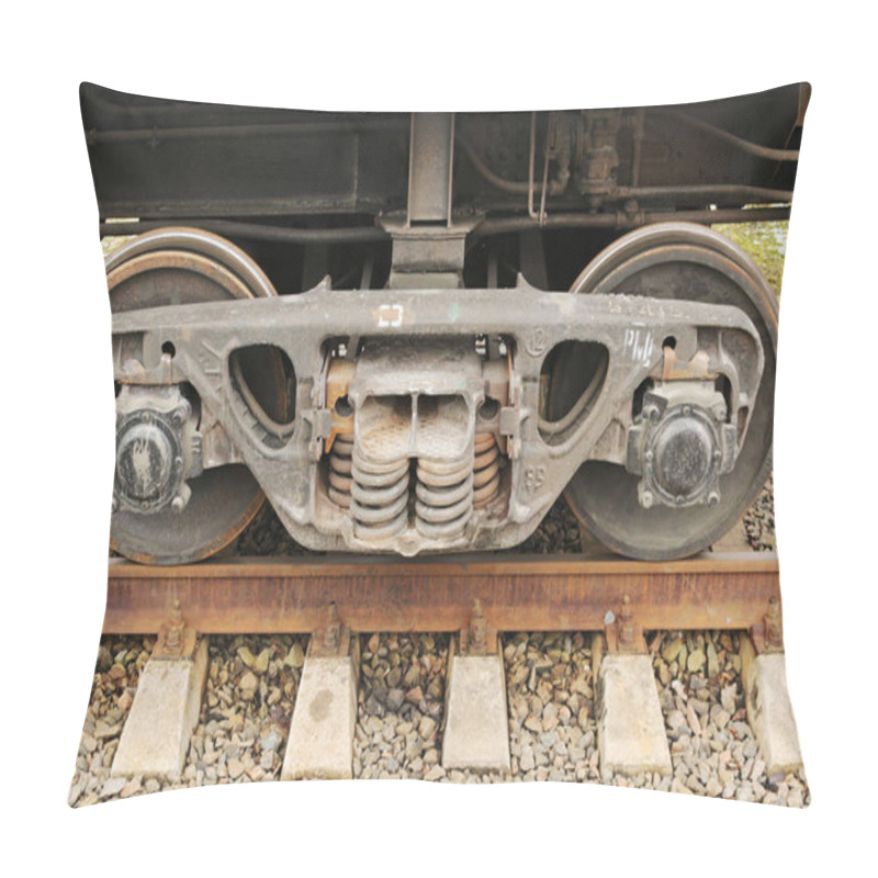 Personality  wheelset in a railway trailer, rails and rubble pillow covers